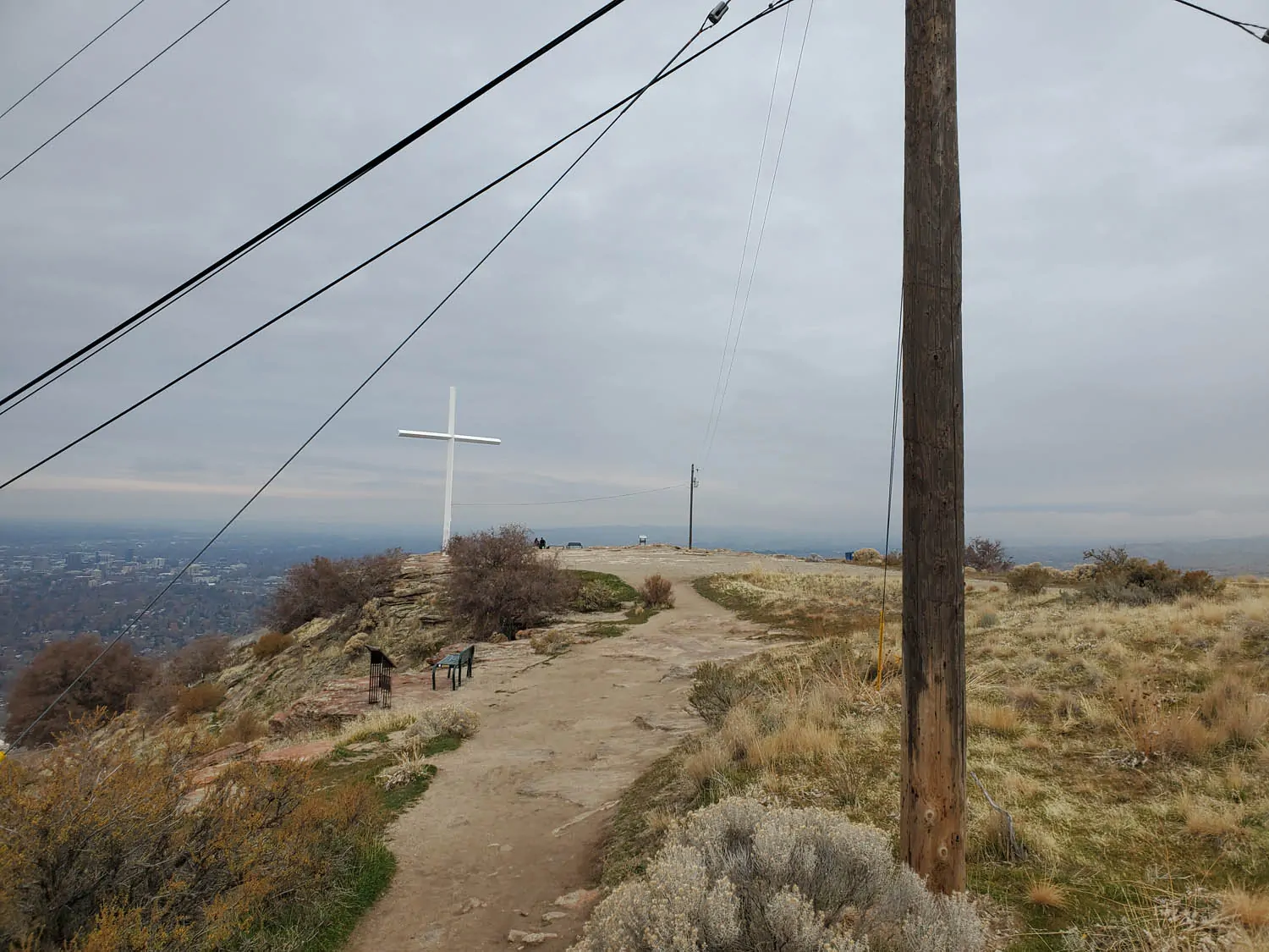 Table Rock Before Current Table Rock summit with dirt path, utility poles, and overhead power lines.