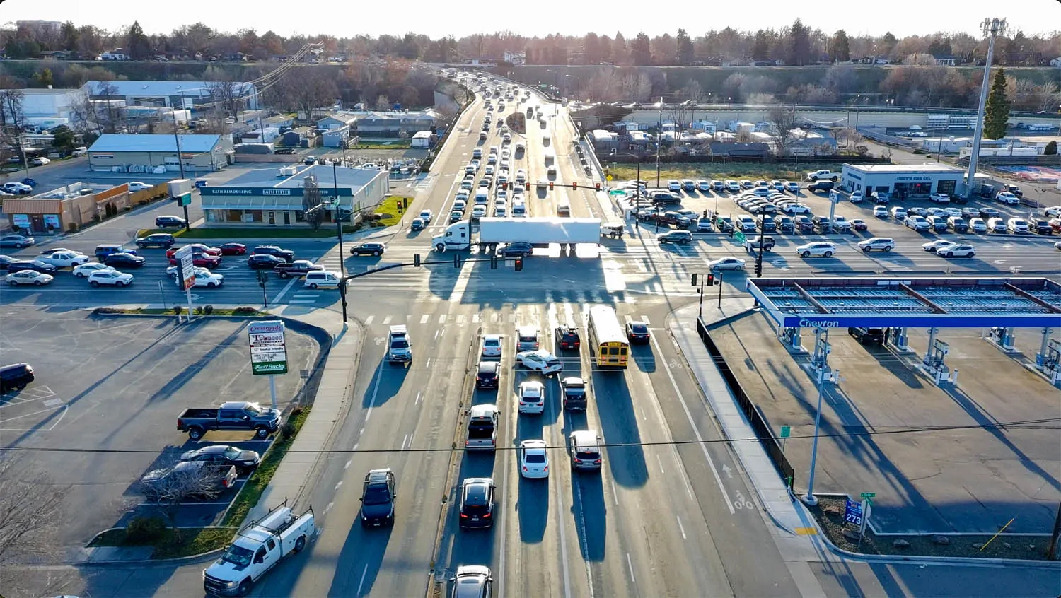 A major Boise traffic corridor lined with parking lots and commercial uses illustrates growth built for speed rather than rooted place.